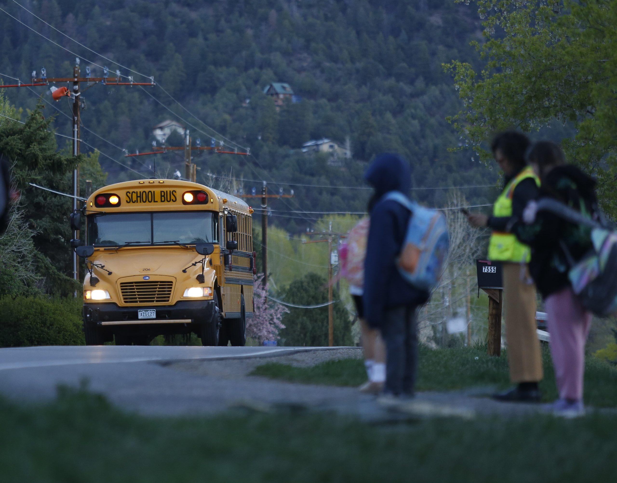 At bus stops across Durango, these volunteers try to shield families from ICE