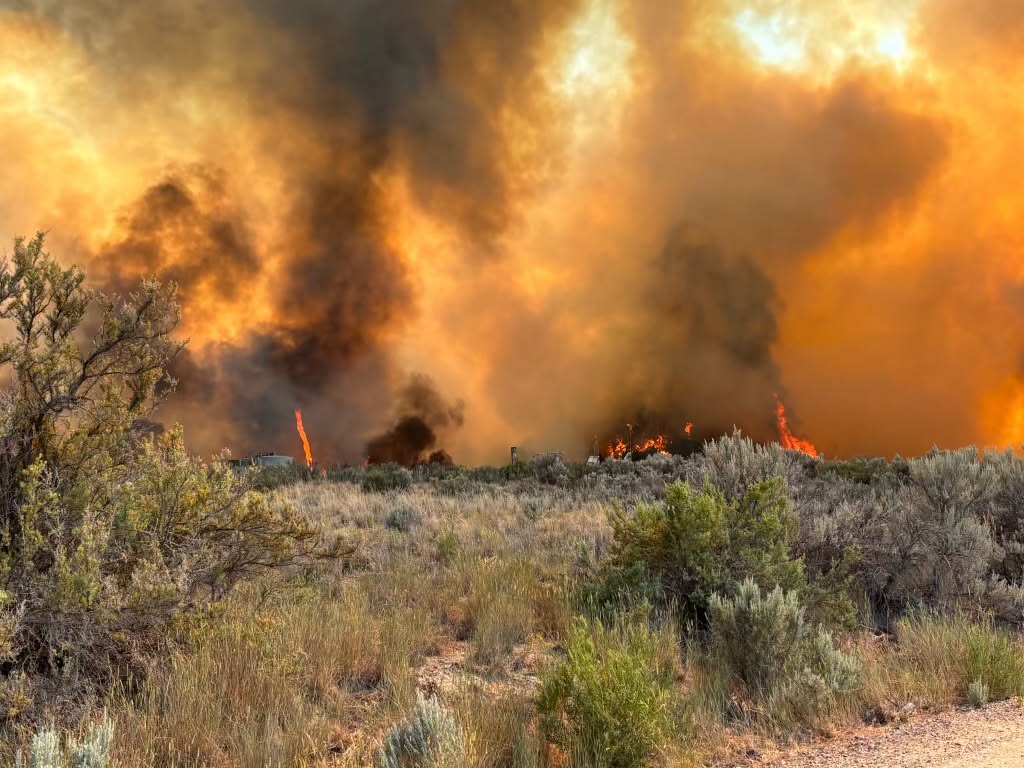 Wind-driven wildfire burns two structures in Rifle, forces evacuations