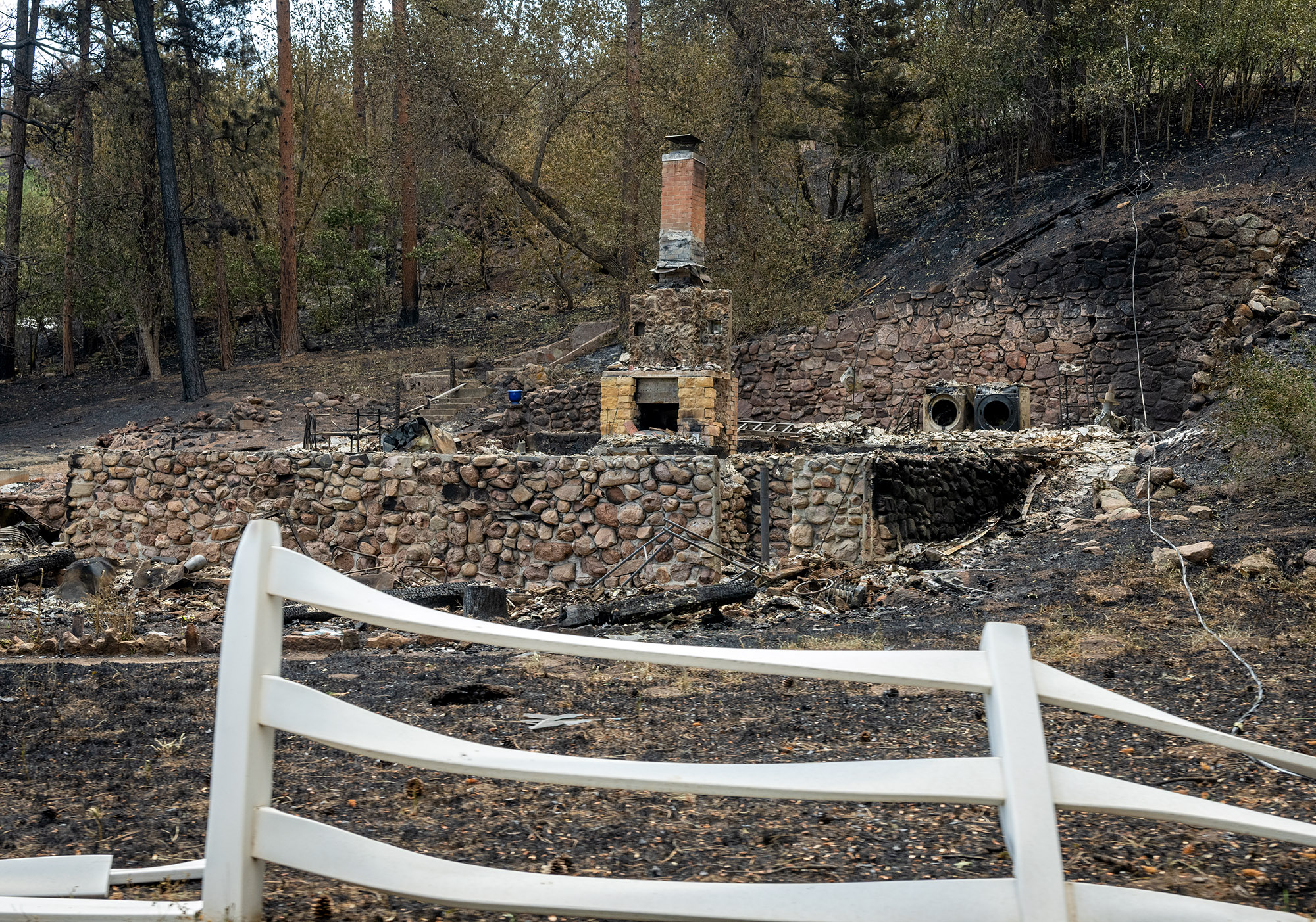 More wildfire evacuees return home as firefighters brace for another day of high fire danger